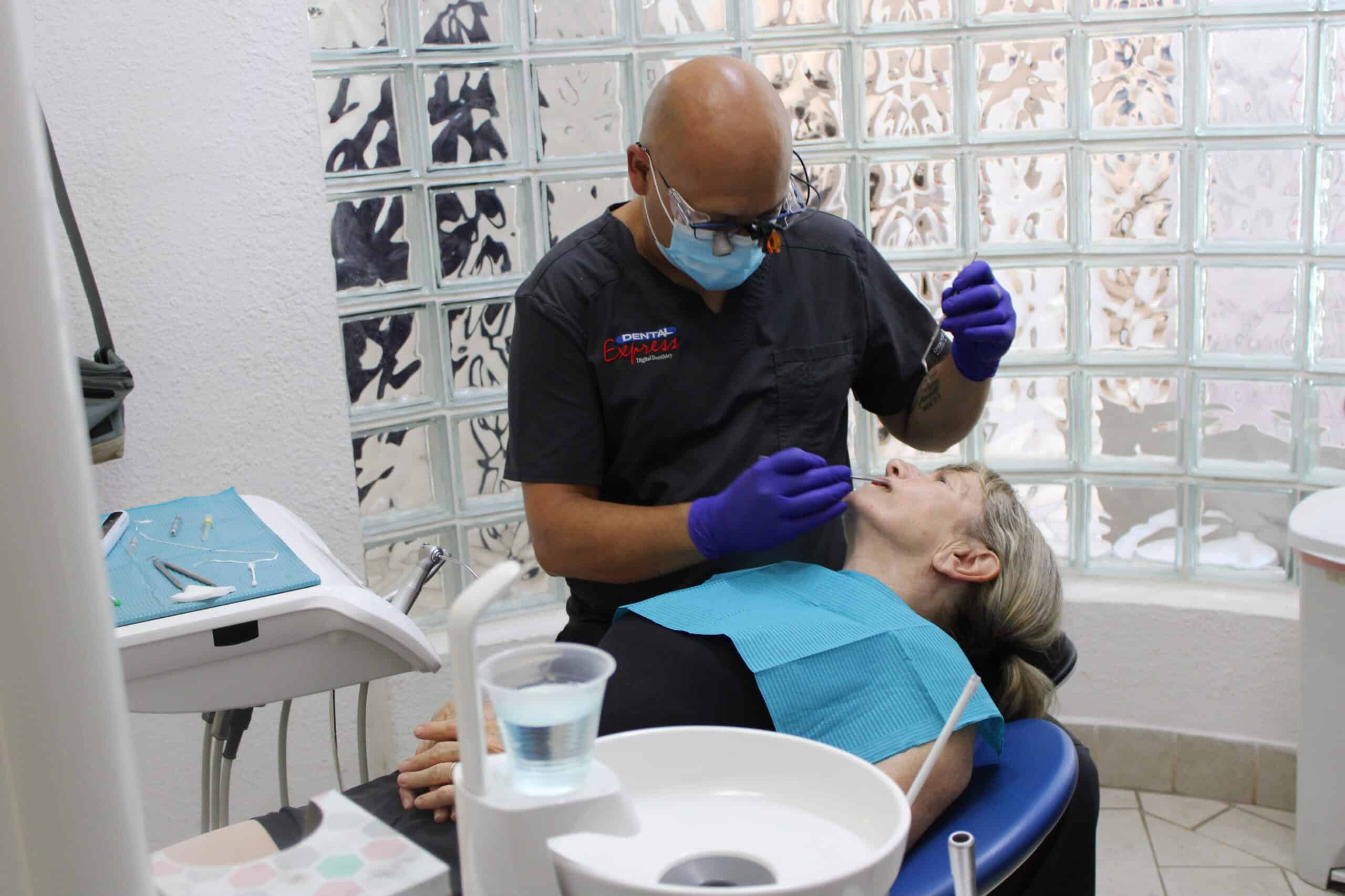 A Dental Express dentist treating a patient in the Puerto Vallarta clinic